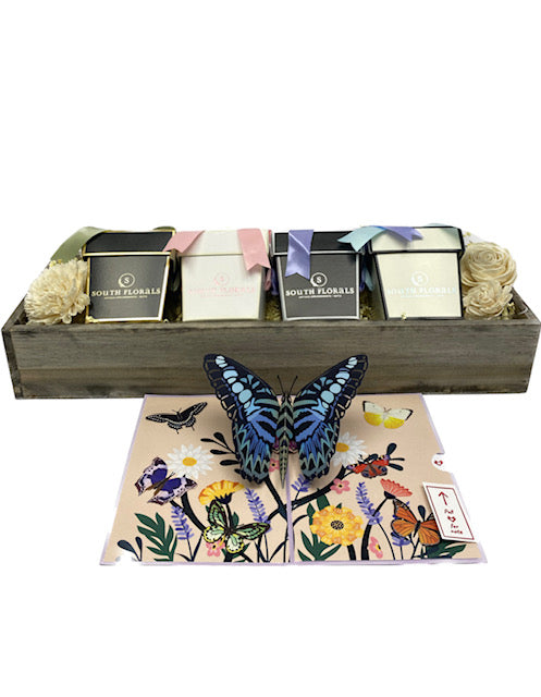 Elegant gift set featuring butterfly-themed boxes, floral accents, and a charming pop-up card, perfect for special occasions.