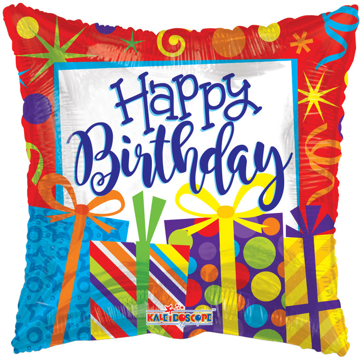 An inflatable 'Happy Birthday' balloon with colorful patterns and presents around the text.