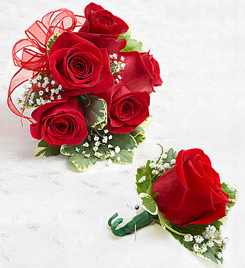 Elegant red rose bouquet with a matching boutonniere, perfect for weddings and special occasions.
