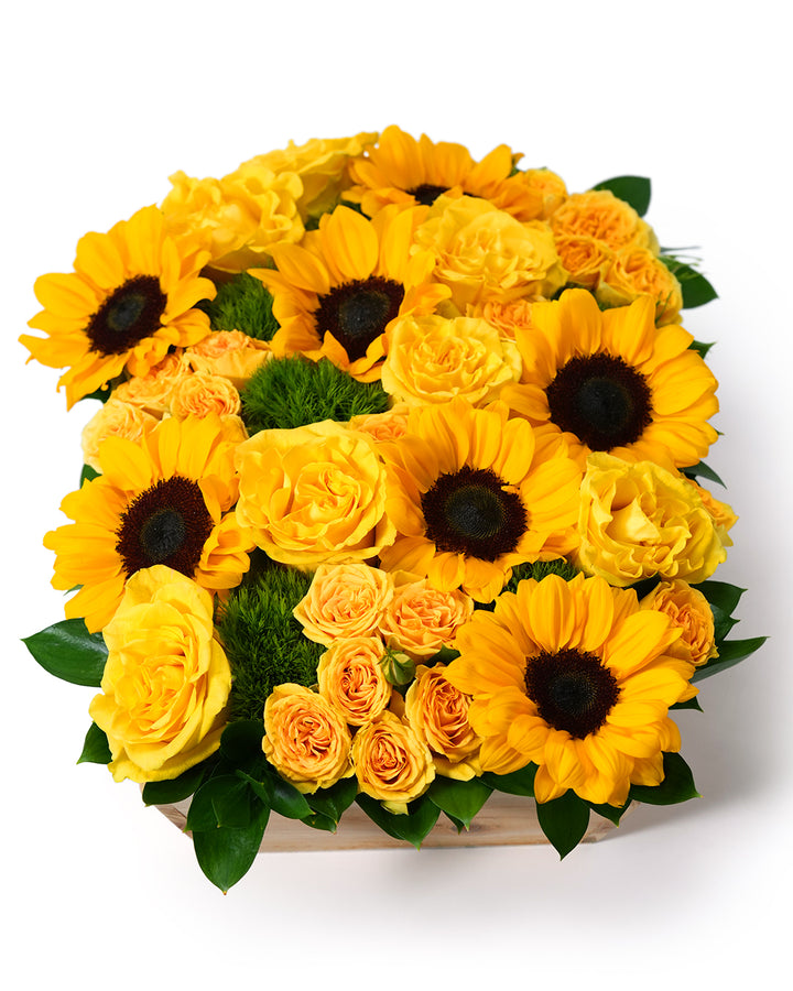 Vibrant bouquet of yellow sunflowers and roses, perfect for brightening any space or occasion.